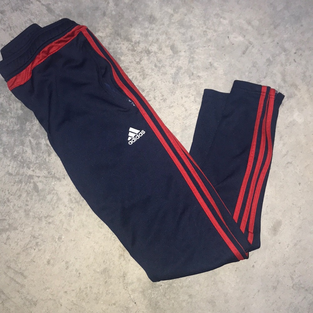Red and navy blue adidas joggers